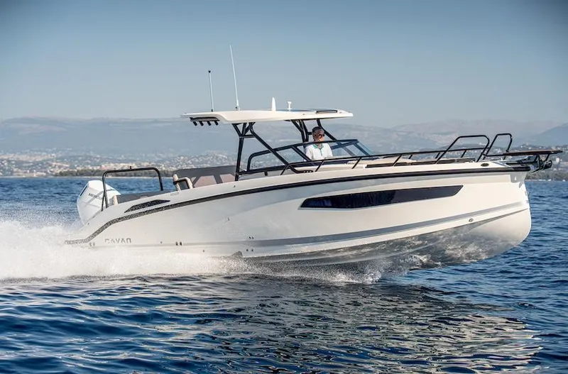 Slide: The Image of 2025 Navan S30 boat cruising on open water, showcasing sleek design and powerful performance. - 1