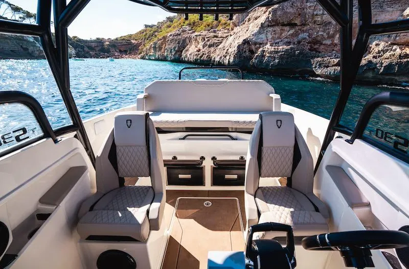 Slide: The Image of Interior of 2025 Navan S30 boat with luxurious seating and scenic ocean view. - 10