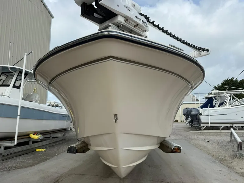 Slide: The Image of 2015 Grady-White Freedom 255 boat on trailer, front view. - 23