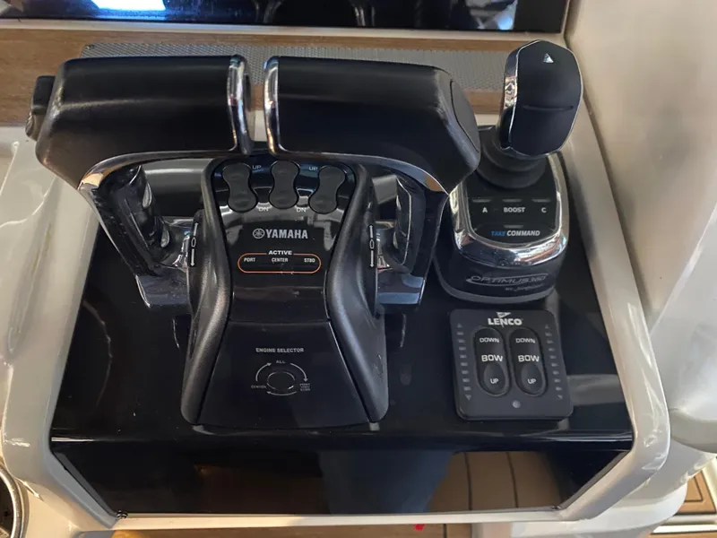 Slide: The Image of Control panel of a 2016 Chris-Craft Catalina 34 with Yamaha throttle and joystick. - 10