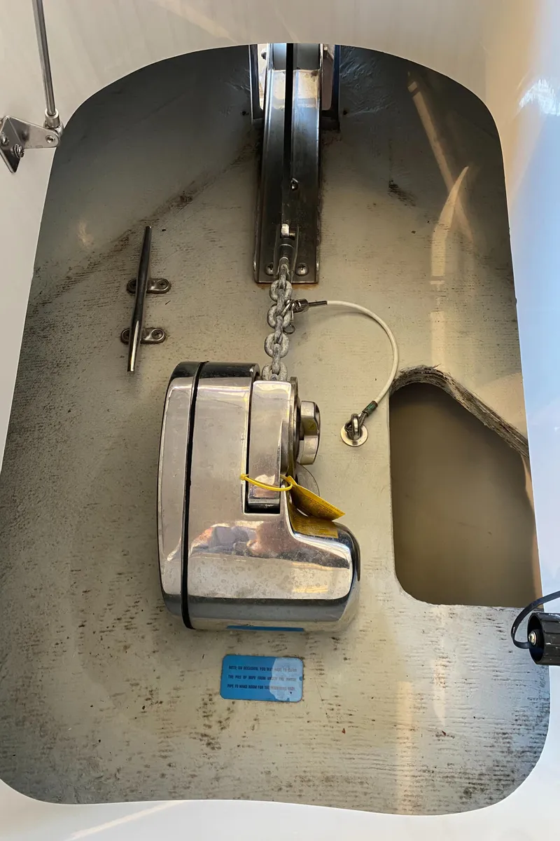 Slide: The Image of 2016 Chris-Craft Catalina 34 anchor winch system with chain and metal components. - 19