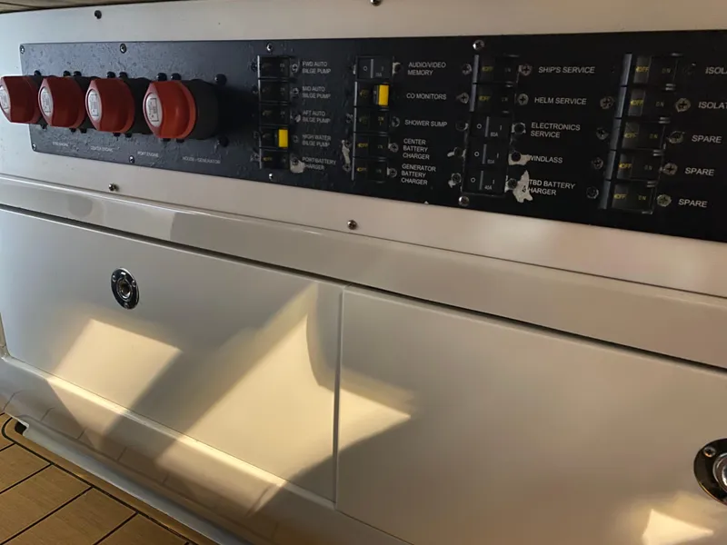 Slide: The Image of Control panel of 2016 Chris-Craft Catalina 34 boat with switches and knobs. - 8