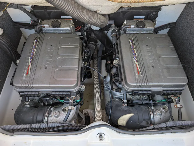 Slide: The Image of Twin engines of a 2008 Yamaha Boats SX230 HO, showcasing detailed mechanical components. - 11