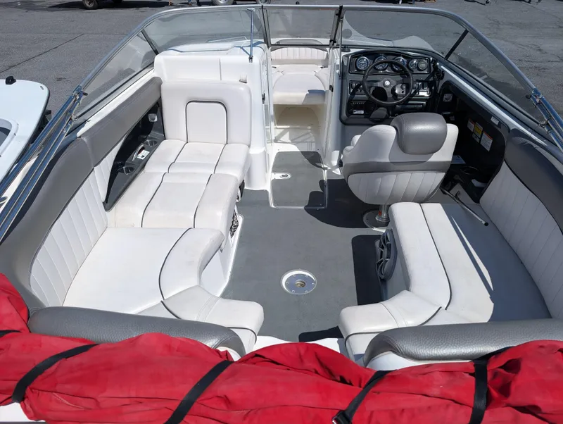 Slide: The Image of 2008 Yamaha Boats SX230 HO interior with white seating and red life jackets. - 5