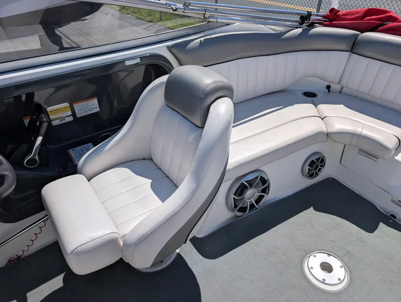 Slide: The Image of 2008 Yamaha Boats SX230 HO interior with white seating and speaker system. - 7