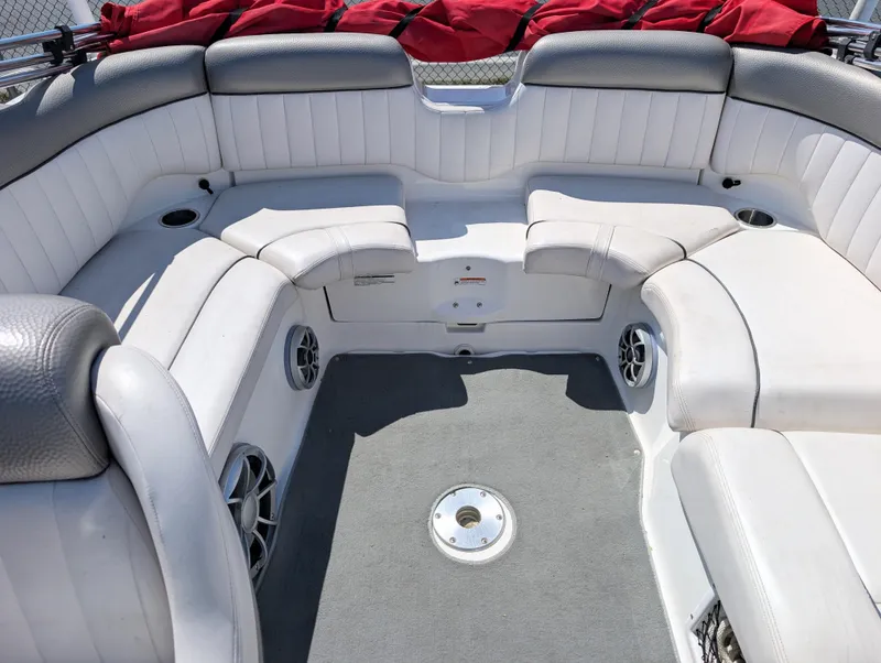 Slide: The Image of 2008 Yamaha Boats SX230 HO interior with white seating and gray accents. - 9