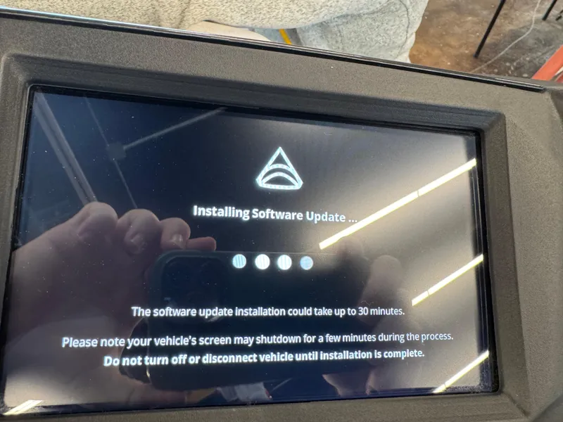 Slide: The Image of 2024 Taiga Orca software update screen displaying installation progress and instructions. - 13