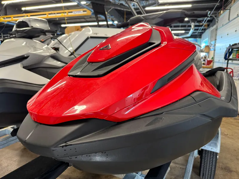 Slide: The Image of 2024 Taiga Orca jet ski displayed outdoors on a trailer, showcasing sleek design. - 6