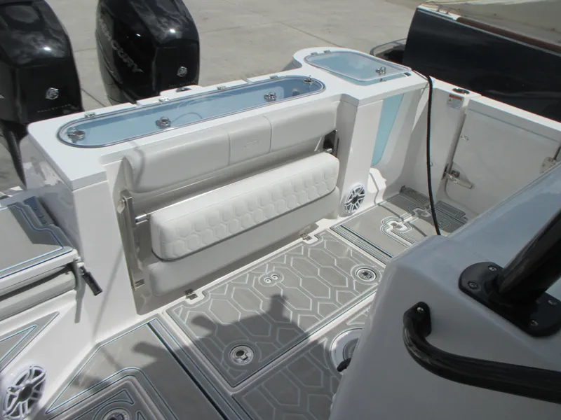 Slide: The Image of 2023 Sea Fox 328 Commander boat interior with seating and storage compartments. - 11