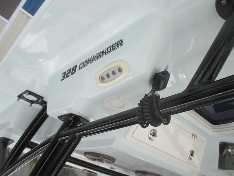 Slide: The Image of 2023 Sea Fox 328 Commander boat console with mounted equipment and branding. - 19