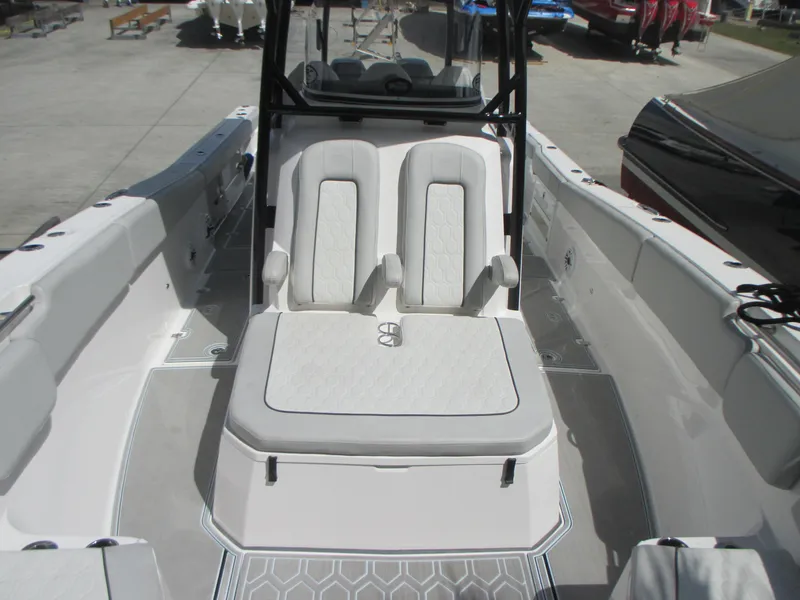 Slide: The Image of 2023 Sea Fox 328 Commander boat interior with white seating and modern design. - 25