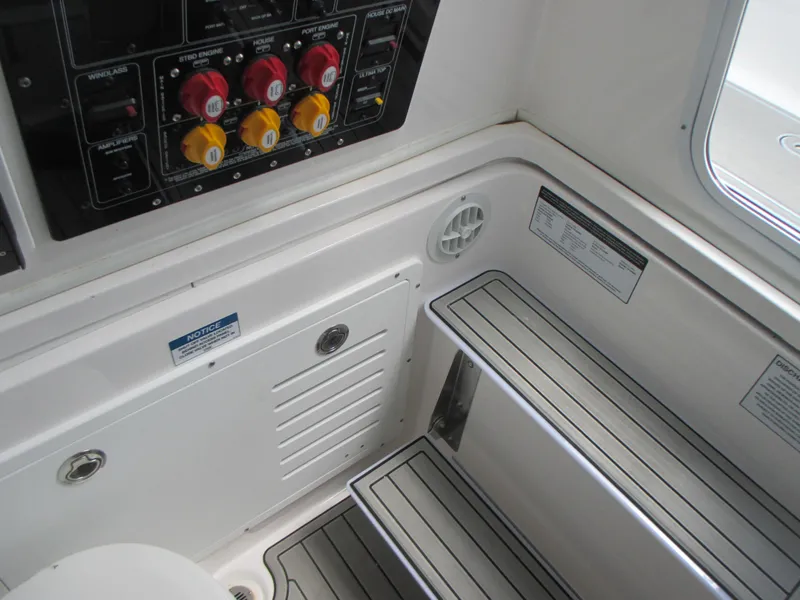 Slide: The Image of 2023 Sea Fox 328 Commander interior with control panel and steps. - 28