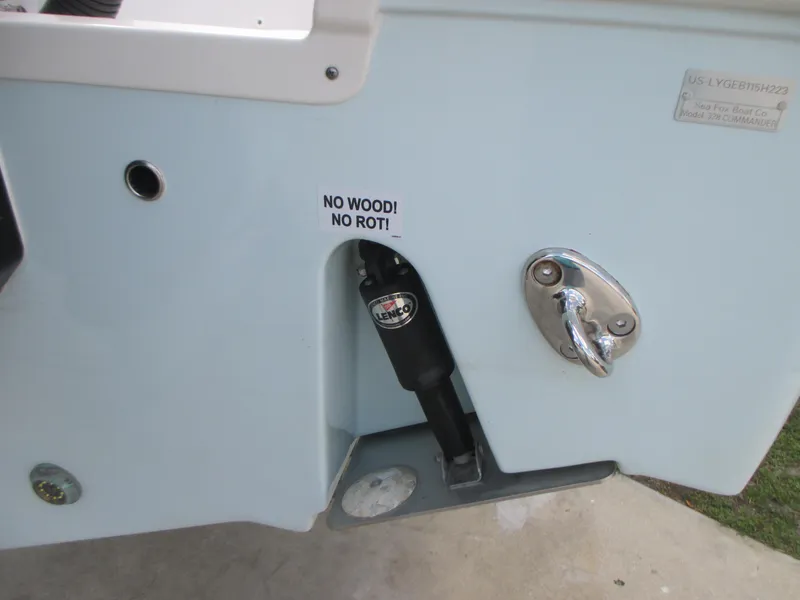 Slide: The Image of 2023 Sea Fox 328 Commander boat detail, featuring "No Wood! No Rot!" sticker. - 7