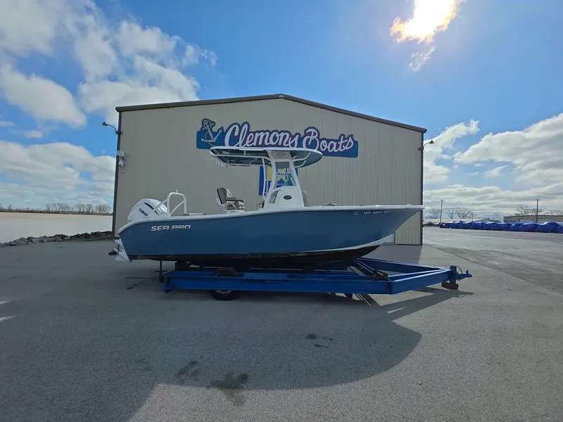 The Image of 2022 Sea Pro 239 Center Console boat on trailer at Clemons Boats dealership. - 0