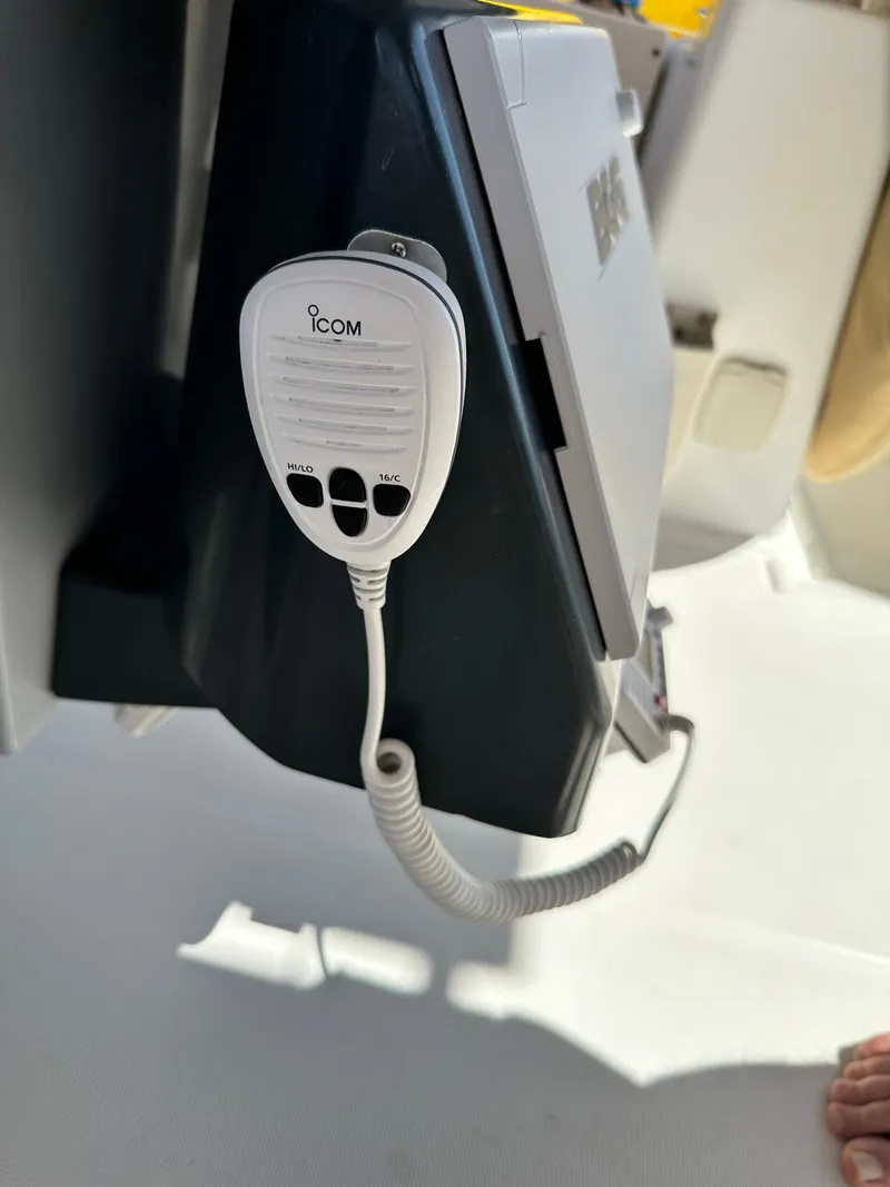 Slide: The Image of ICOM radio microphone on a 2012 Beneteau Oceanis 41 sailboat. - 22