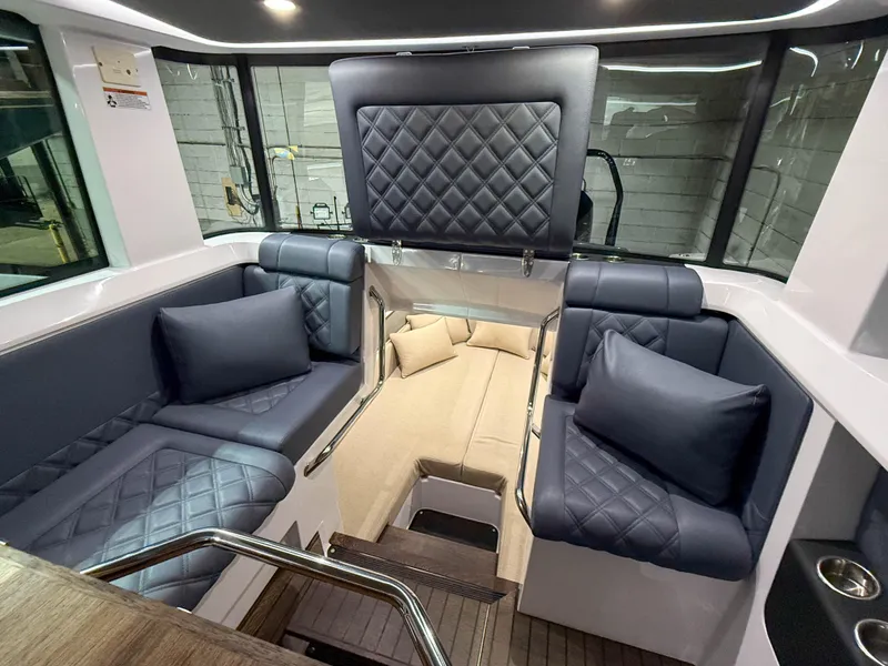 Slide: The Image of Luxurious interior of 2020 Axopar 37 XC boat with quilted seating and modern design. - 22