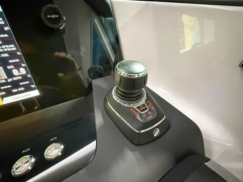 Slide: The Image of Control panel of 2020 Axopar 37 XC boat with joystick and display. - 34