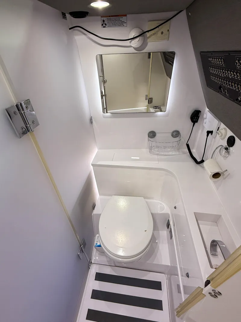 Slide: The Image of 2020 Axopar 37 XC boat bathroom with modern fixtures and compact design. - 39