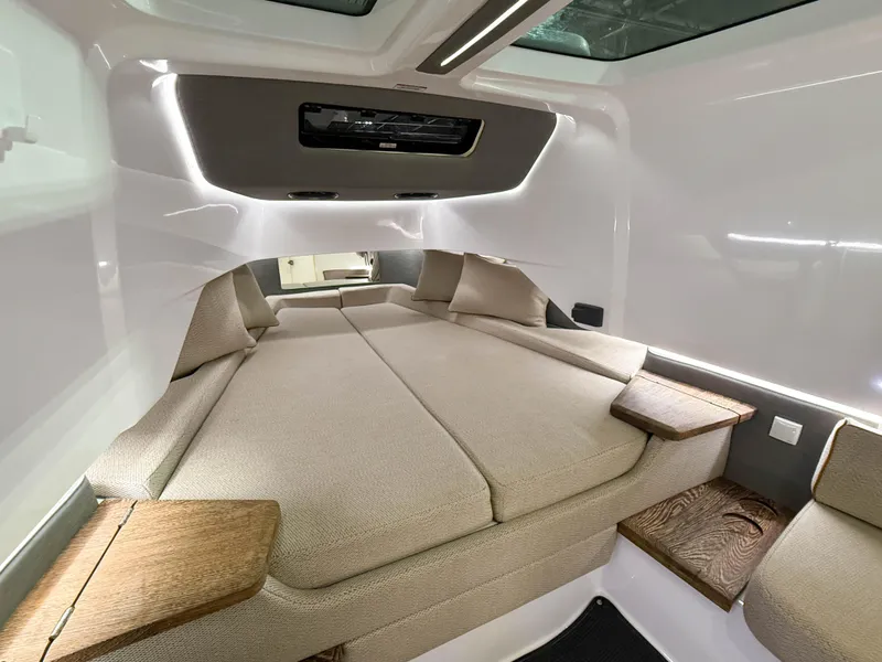 Slide: The Image of Luxurious interior cabin of 2020 Axopar 37 XC with modern design and comfortable seating. - 43