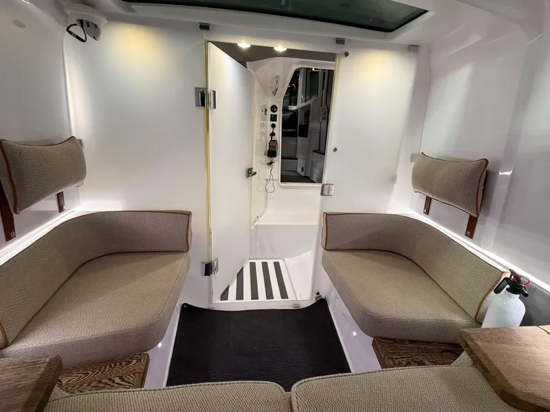 Slide: The Image of Interior of 2020 Axopar 37 XC boat with cozy seating and modern design. - 44
