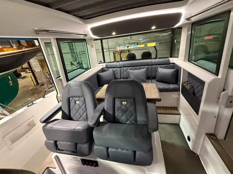 Slide: The Image of Interior of 2020 Axopar 37 XC boat with luxurious seating and modern design. - 45