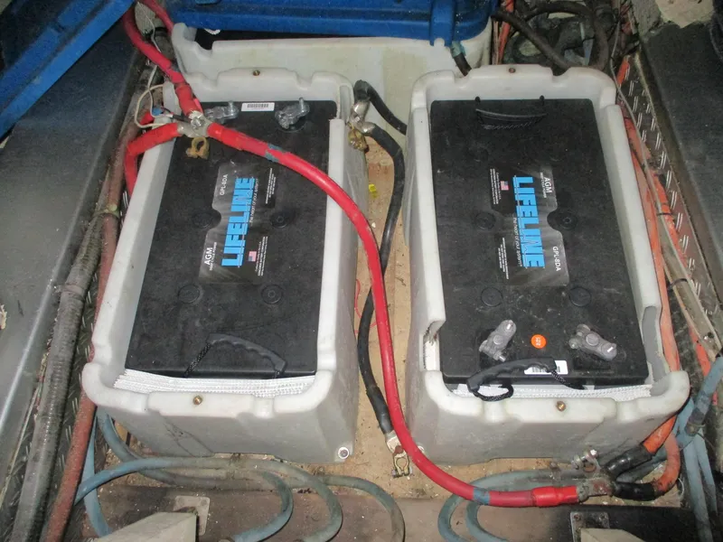 Slide: The Image of Batteries in a 1994 Grand Banks 49 Motoryacht engine compartment. - 18