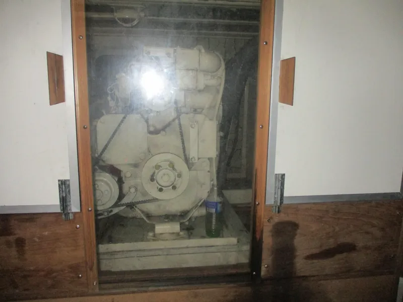 Slide: The Image of Engine compartment of 1994 Grand Banks 49 Motoryacht, visible through glass panel. - 20