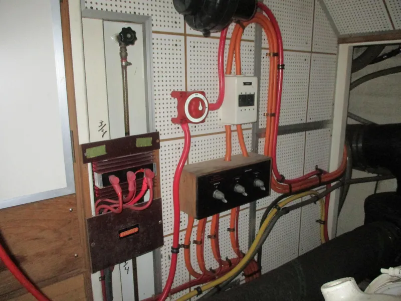 Slide: The Image of Electrical panel with wiring in a 1994 Grand Banks 49 Motoryacht engine room. - 24
