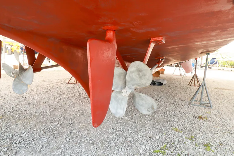 Slide: The Image of Underwater view of 1994 Grand Banks 49 Motoryacht propellers and rudders on dry dock. - 34