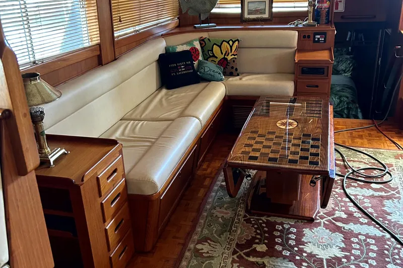 Slide: The Image of Luxurious interior of a 1994 Grand Banks 49 Motoryacht with elegant seating and decor. - 7