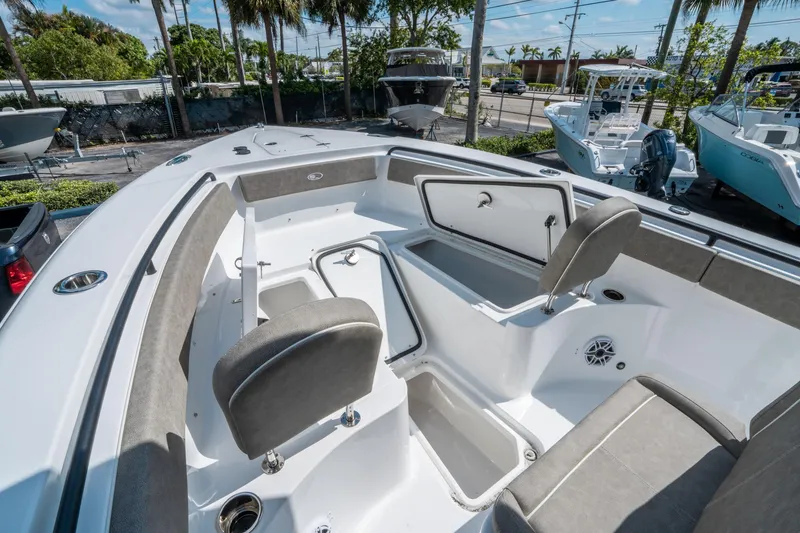 Slide: The Image of 2025 Sea Hunt Gamefish 25 boat interior with seating and storage compartments. - 30