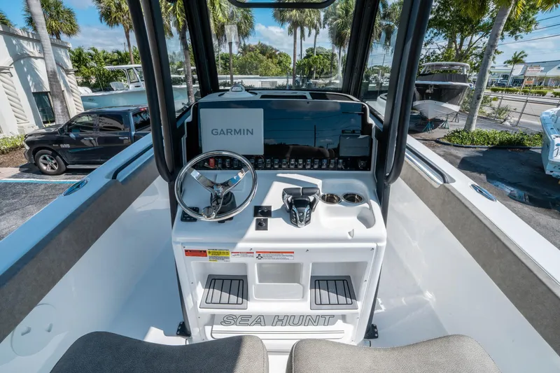 Slide: The Image of 2025 Sea Hunt Gamefish 25 boat dashboard with Garmin navigation system. - 18