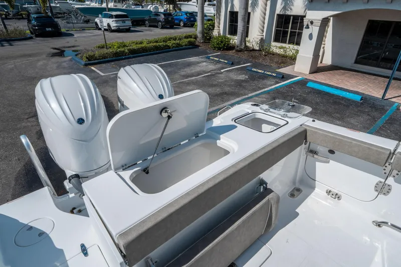 Slide: The Image of 2025 Sea Hunt Gamefish 25 boat with dual engines and spacious deck layout. - 14