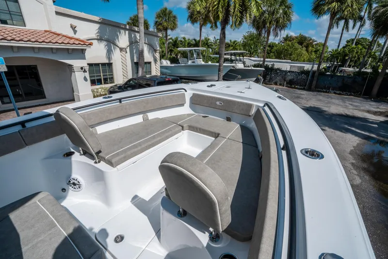 Slide: The Image of 2025 Sea Hunt Gamefish 25 boat with spacious seating and modern design. - 27