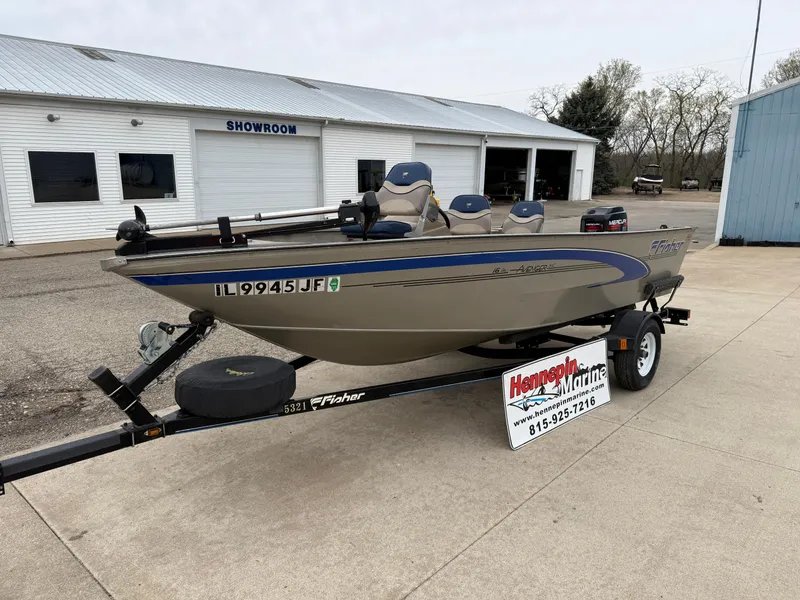 Slide: The Image of 1989 Fisher 16 Pro Avenger SC boat on trailer outside showroom. - 3