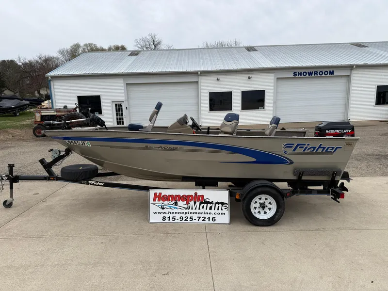 Slide: The Image of 1989 Fisher 16 Pro Avenger SC boat on trailer outside Hennepin Marine showroom. - 4