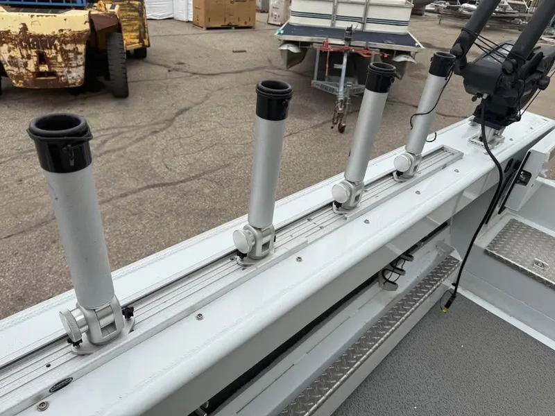 Slide: The Image of 2023 Hewescraft 240 Ocean Pro ET HT boat with rod holders on deck. - 10