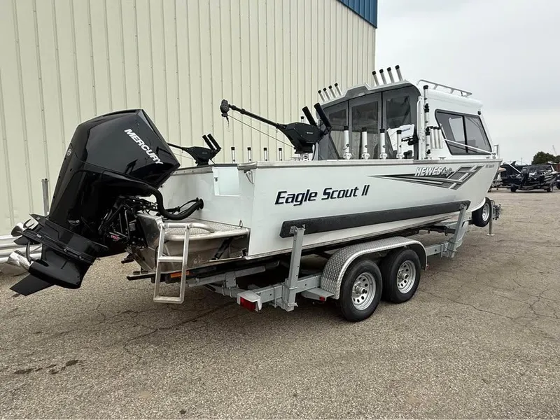 Slide: The Image of 2023 Hewescraft 240 Ocean Pro ET HT boat on trailer, side view. - 5