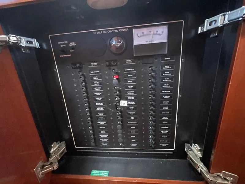 Slide: The Image of Electrical control panel inside a 2006 Carver 56 Voyager yacht. - 35