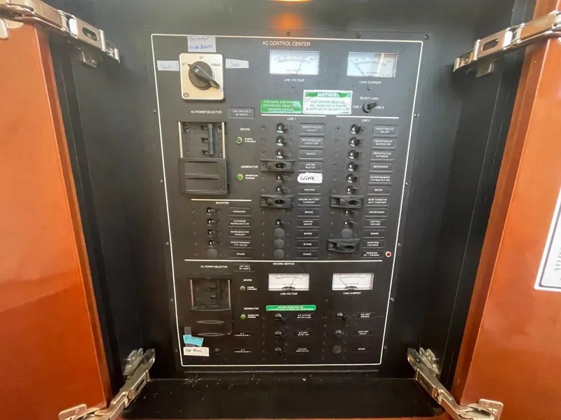 Slide: The Image of Electrical control panel inside a 2006 Carver 56 Voyager yacht. - 36
