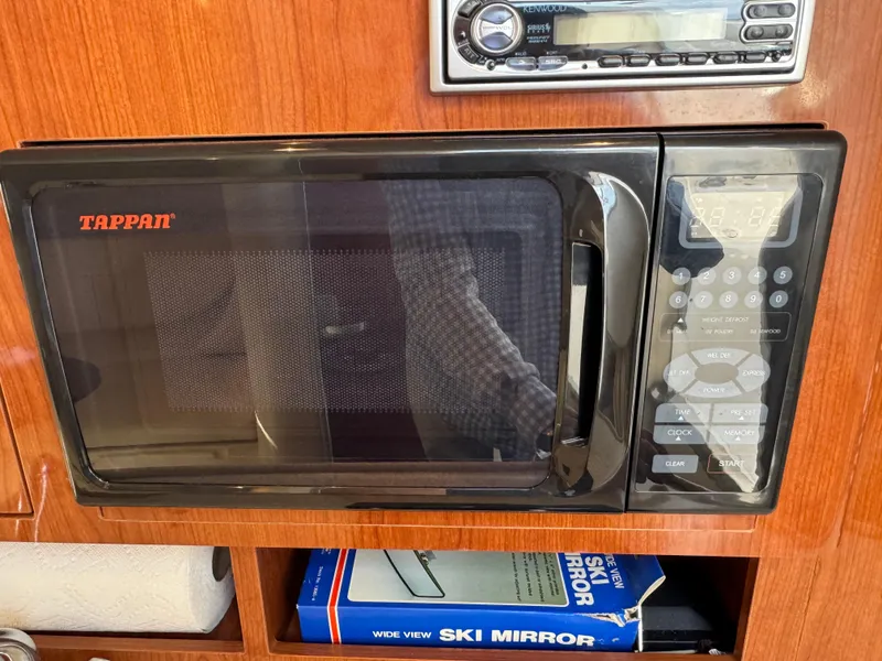 Slide: The Image of Tappan microwave in a 2006 Regal 2565 Window Express boat kitchen setup. - 27