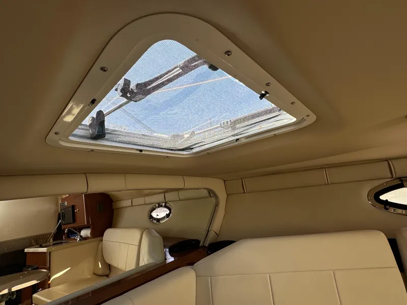 Slide: The Image of Interior view of 2006 Regal 2565 Window Express boat cabin with skylight. - 33