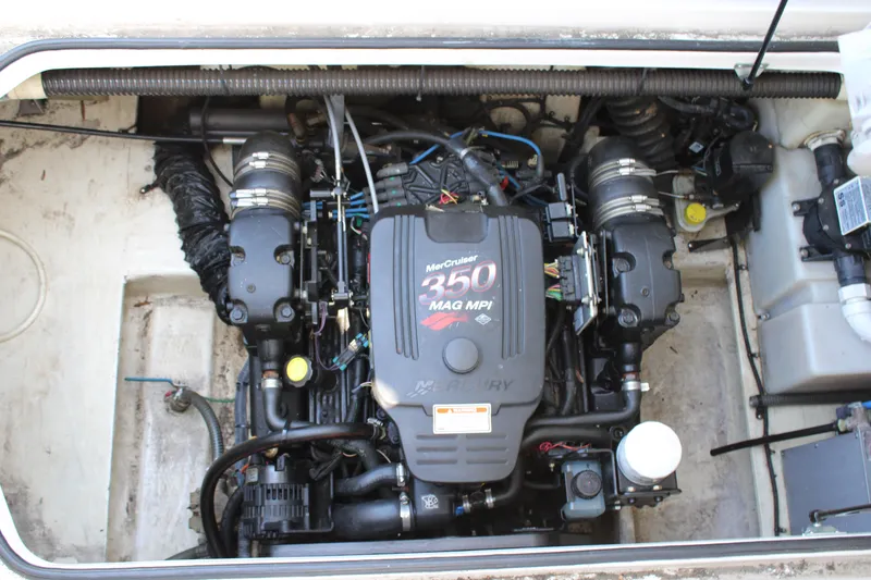Slide: The Image of Engine compartment of a 2006 Regal 2565 Window Express boat with MerCruiser 350 MAG MPI engine. - 6