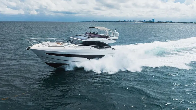 Slide: The Image of 2022 Princess S66 yacht cruising swiftly on open water. - 5