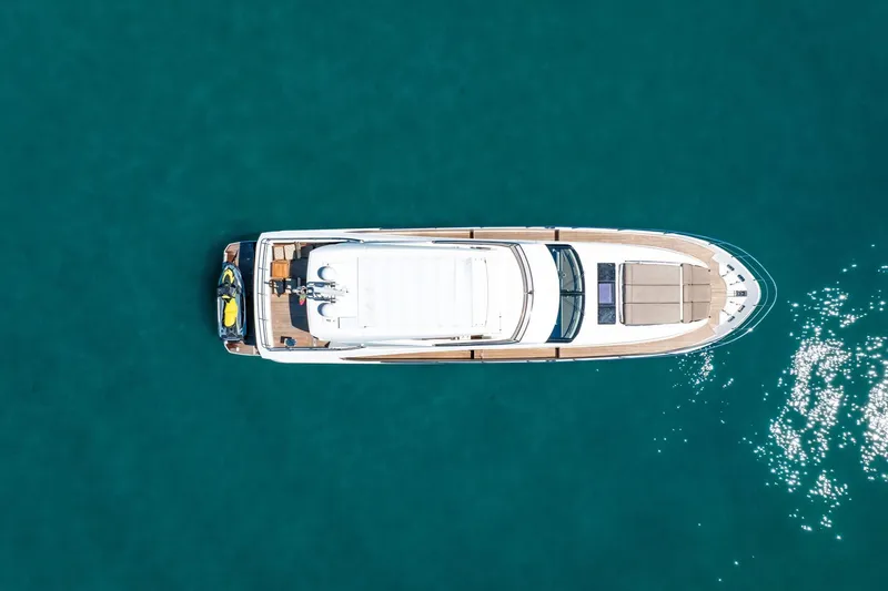 Slide: The Image of Aerial view of 2015 Prestige 750 yacht on clear blue water. - 87