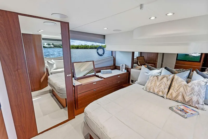 Slide: The Image of Luxurious interior of 2025 Princess F50 yacht with elegant seating and scenic views. - 11
