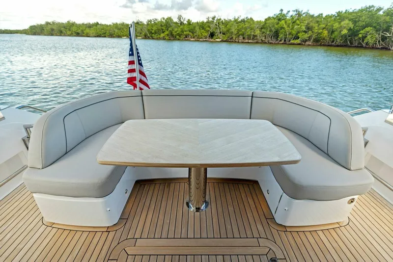 Slide: The Image of Luxurious cabin interior of 2025 Princess F50 yacht with elegant bedding and wood accents. - 24