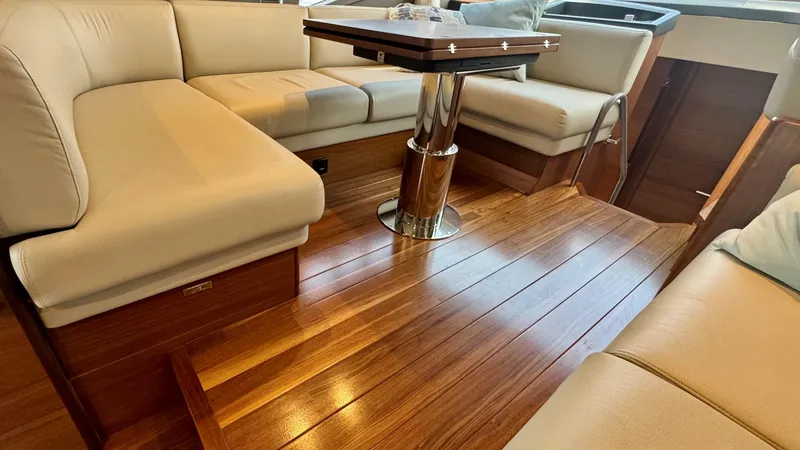 Slide: The Image of Luxurious interior of 2025 Princess F50 yacht with elegant seating and scenic water views. - 6