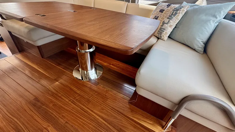 Slide: The Image of Luxurious interior of 2025 Princess F50 yacht with elegant seating and scenic water view. - 8