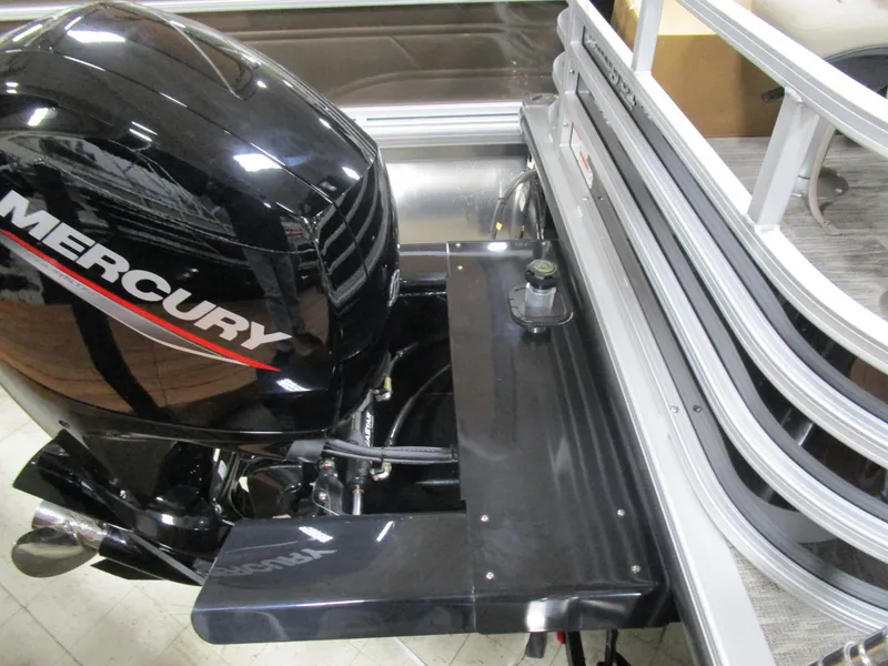 Slide: The Image of 2025 Ranger 223 FC boat with Mercury outboard motor, rear view. - 22